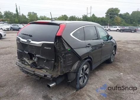 2015 Honda Cr-V Touring z USA, uszkodzony, nr VIN 5J6RM4H90FL014889